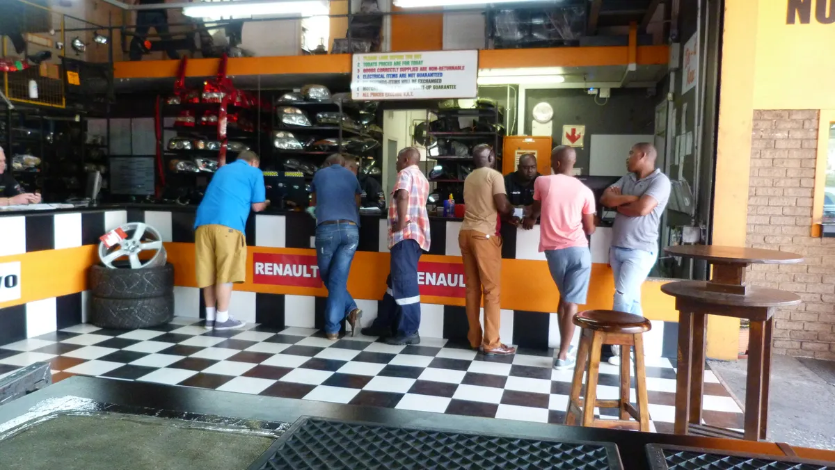 Customers being served at the Sparesboyz Kia parts counter