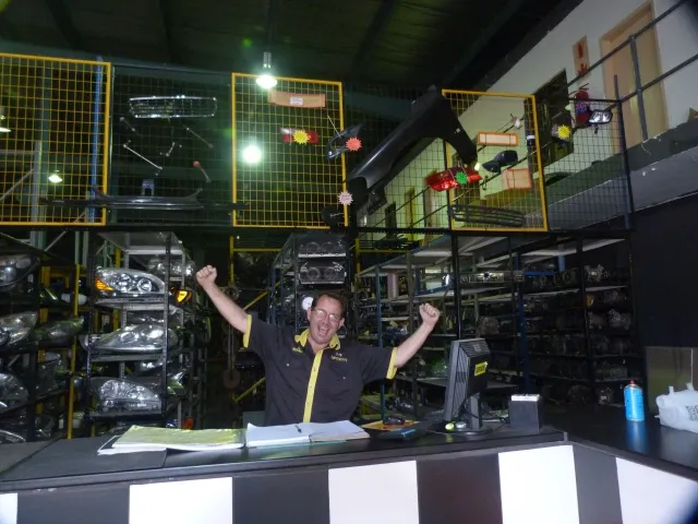 Sparesboyz team member ready to help with Kia parts at the counter in Durban